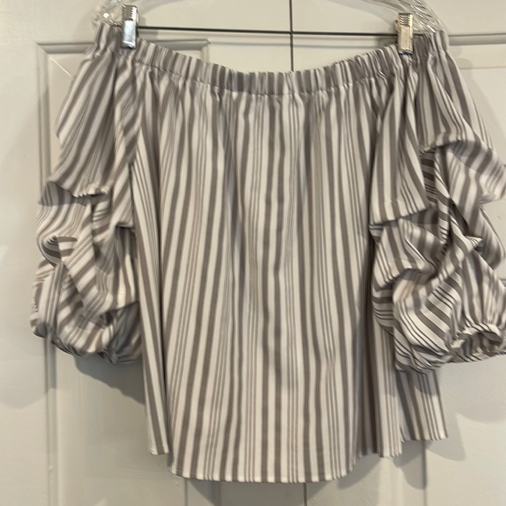 She and Sky size Medium off the shoulder top